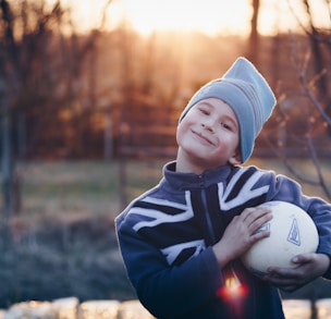 boy holding a ball