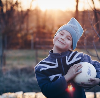 boy holding a ball