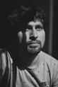 grayscale photography of man looking upward