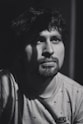grayscale photography of man looking upward