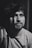 grayscale photography of man looking upward