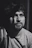 grayscale photography of man looking upward