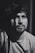 grayscale photography of man looking upward