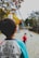 A child playing outdoors in a comfortable sweatshirt from tempdream.com.