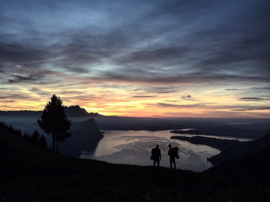 two person walking down on the mountain in Lake Lucerne Switzerland