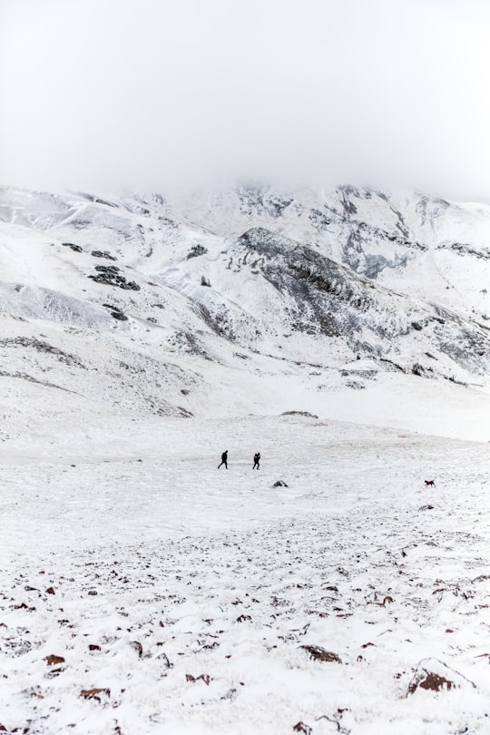 two people walking on snow in Tushar Mountains United States