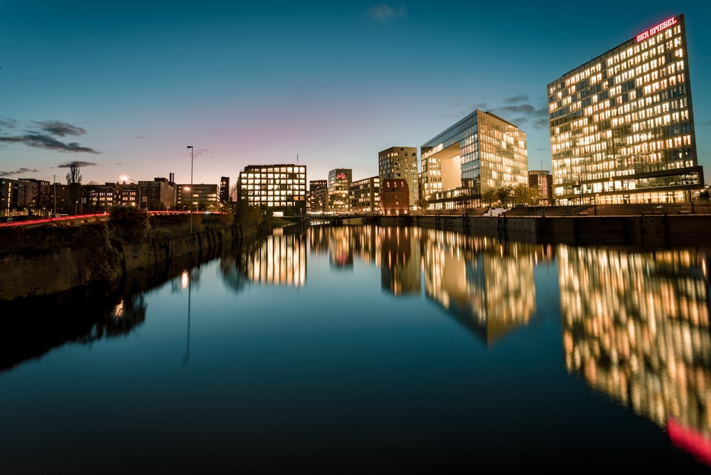 body of water near city buildings