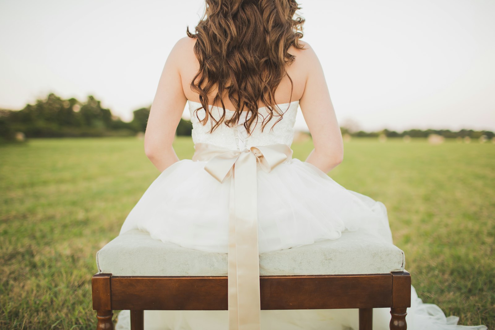 Canon EOS 6D + Canon EF 35mm F1.4L USM sample photo. Sitting woman wearing white photography