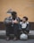 man holding boy's head