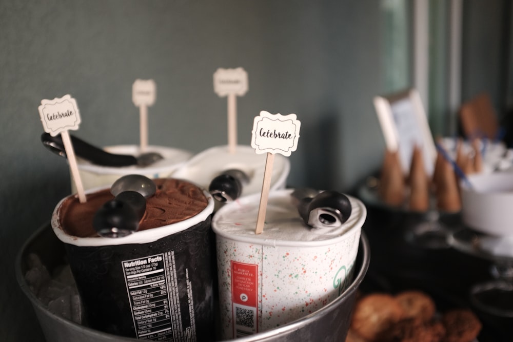 four cups of ice cream in bowl