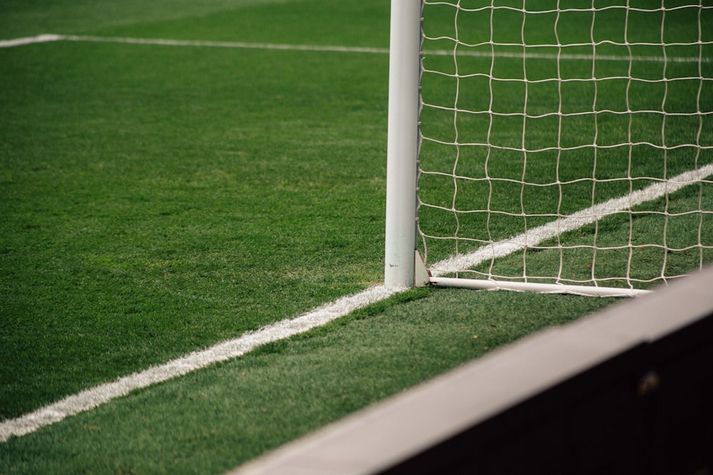 white soccer goal on focus photo