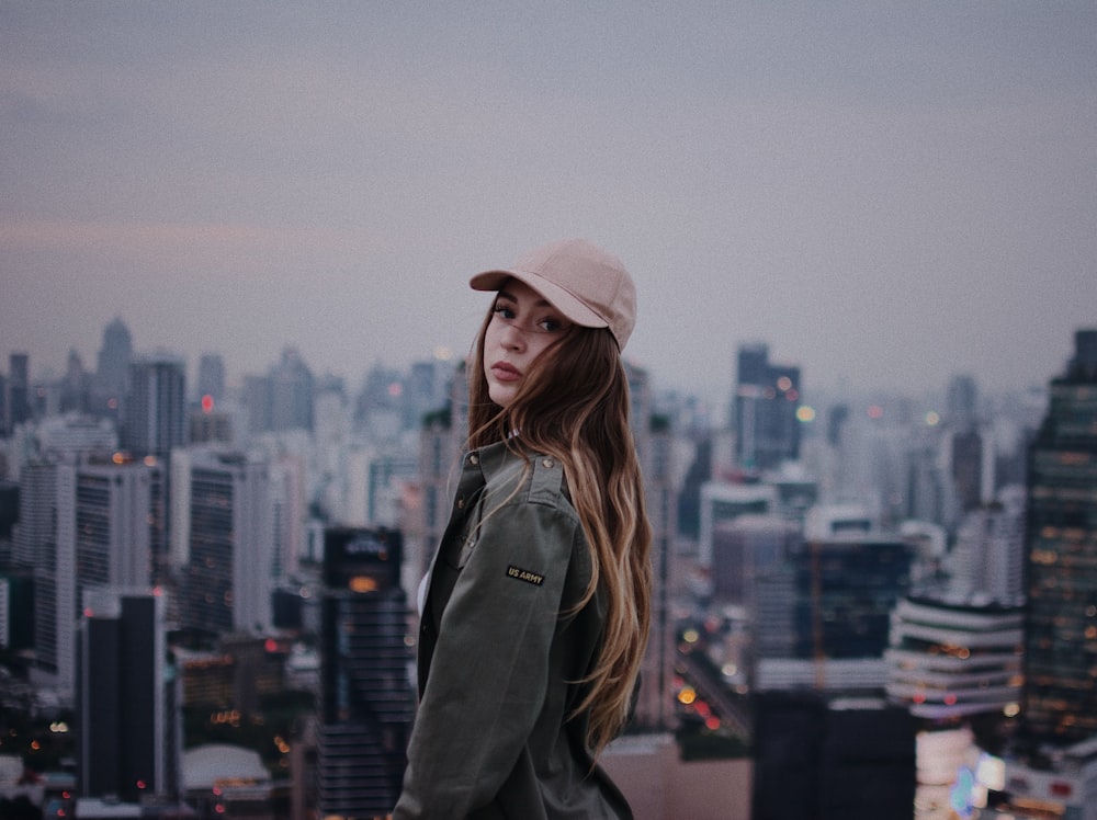 woman standing at the top of building