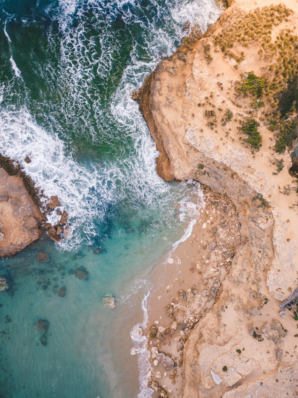 aerial view of ocean touching land