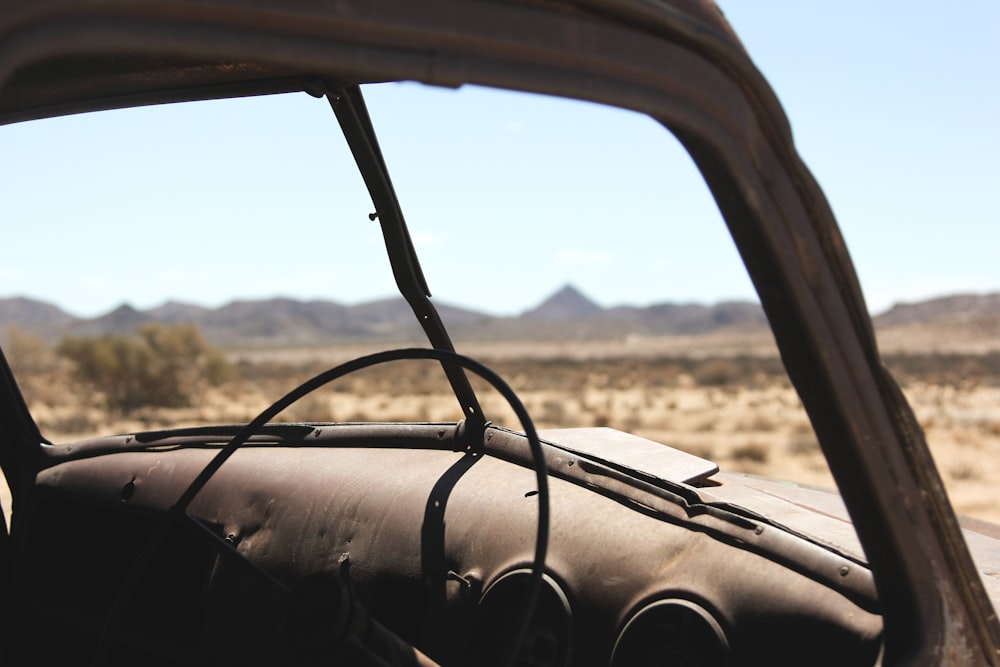 black car steering wheel in shallow focus lens