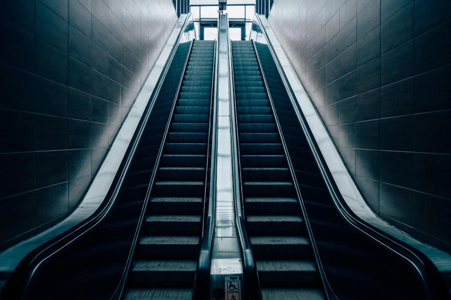 Twin escalators rising through a modern building