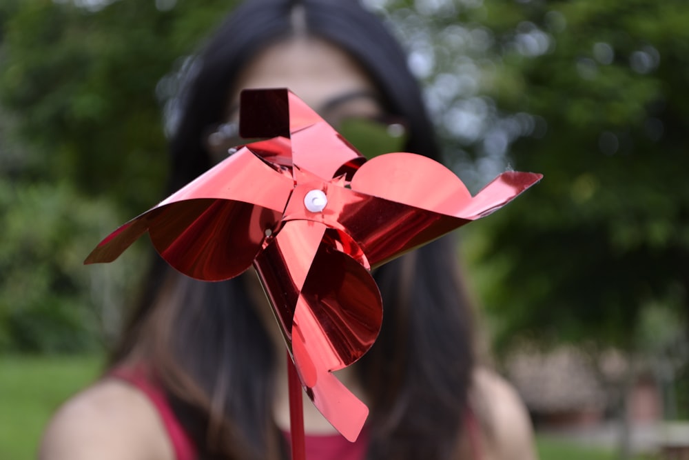 selective focus photography of red paper mill