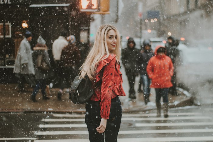 Free dating sites Edmonton — woman on a winter street in the city, representing local Edmonton dating searches