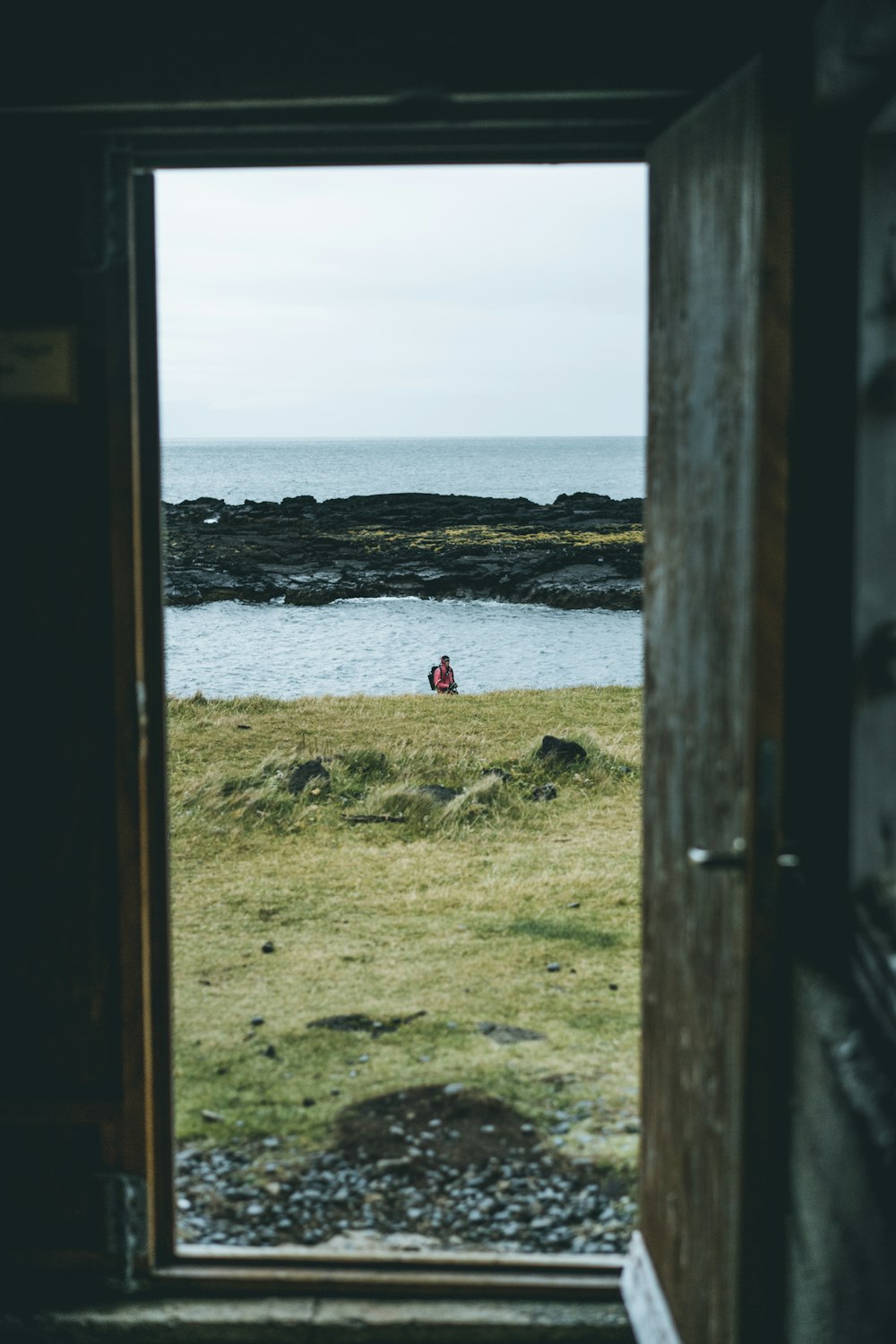 person standing near body of water