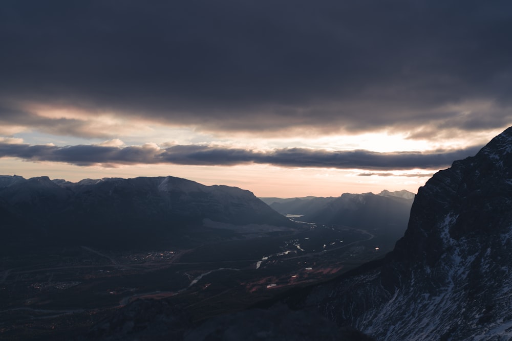 mountains under heavy clouds