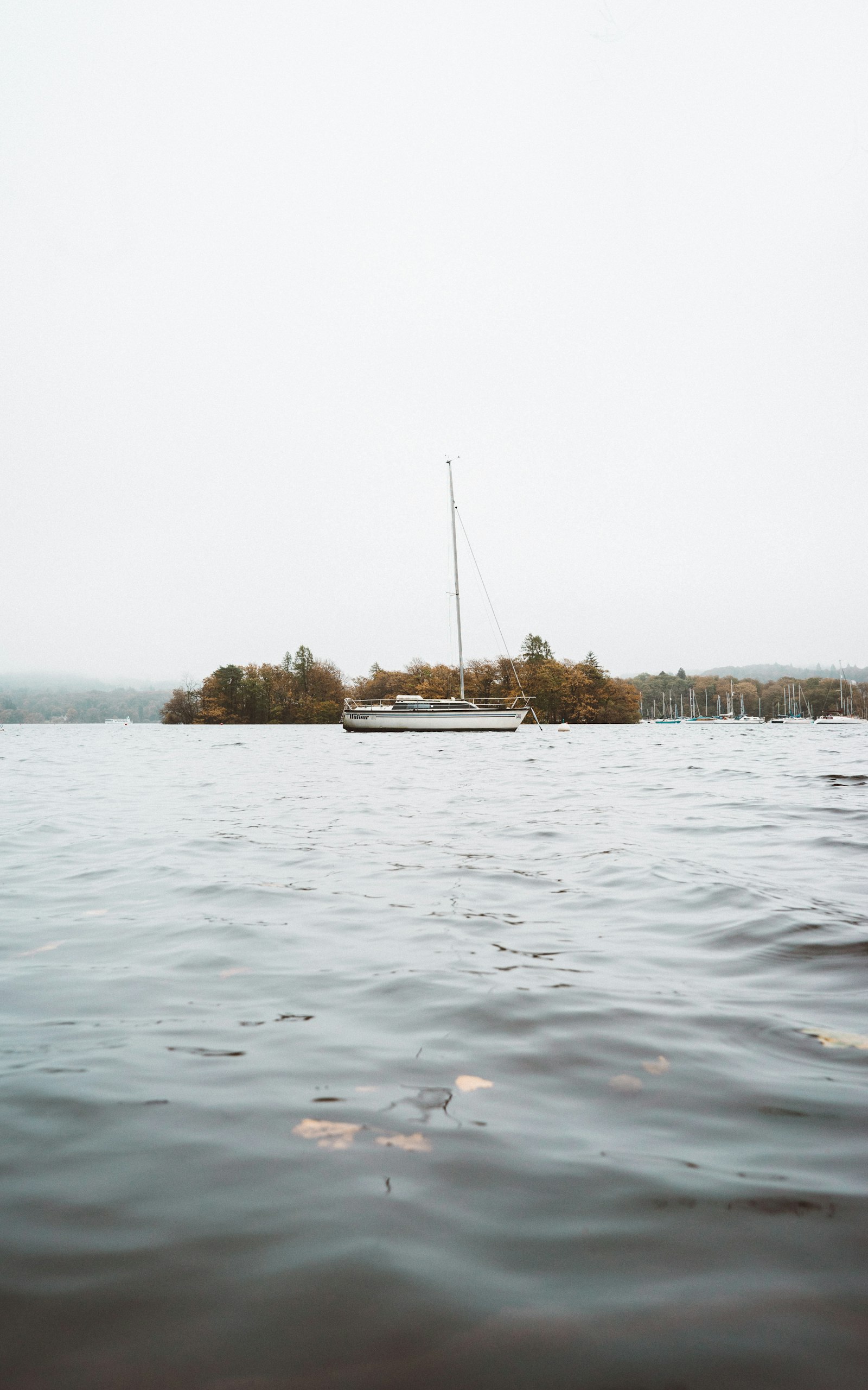 Sony a7 II + Sony FE 28mm F2 sample photo. Gray and white boat photography