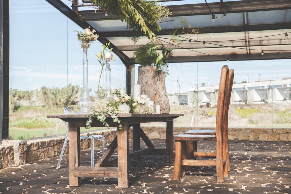 green leafed plants on brown wooden table