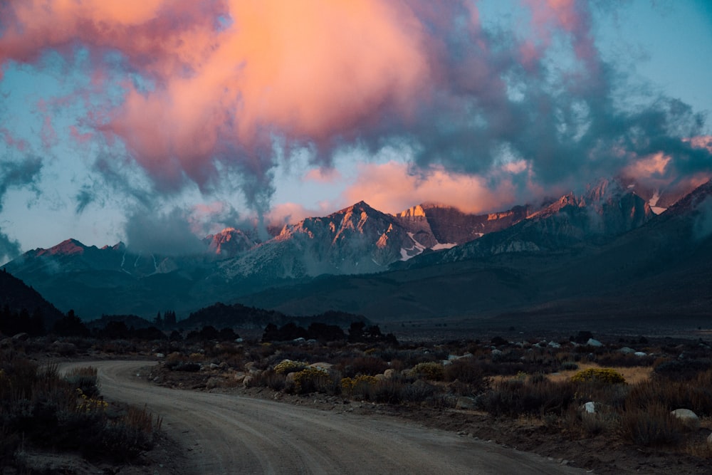 gray road near mountains