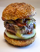 A mouthwatering burger with fresh ingredients and toppings.