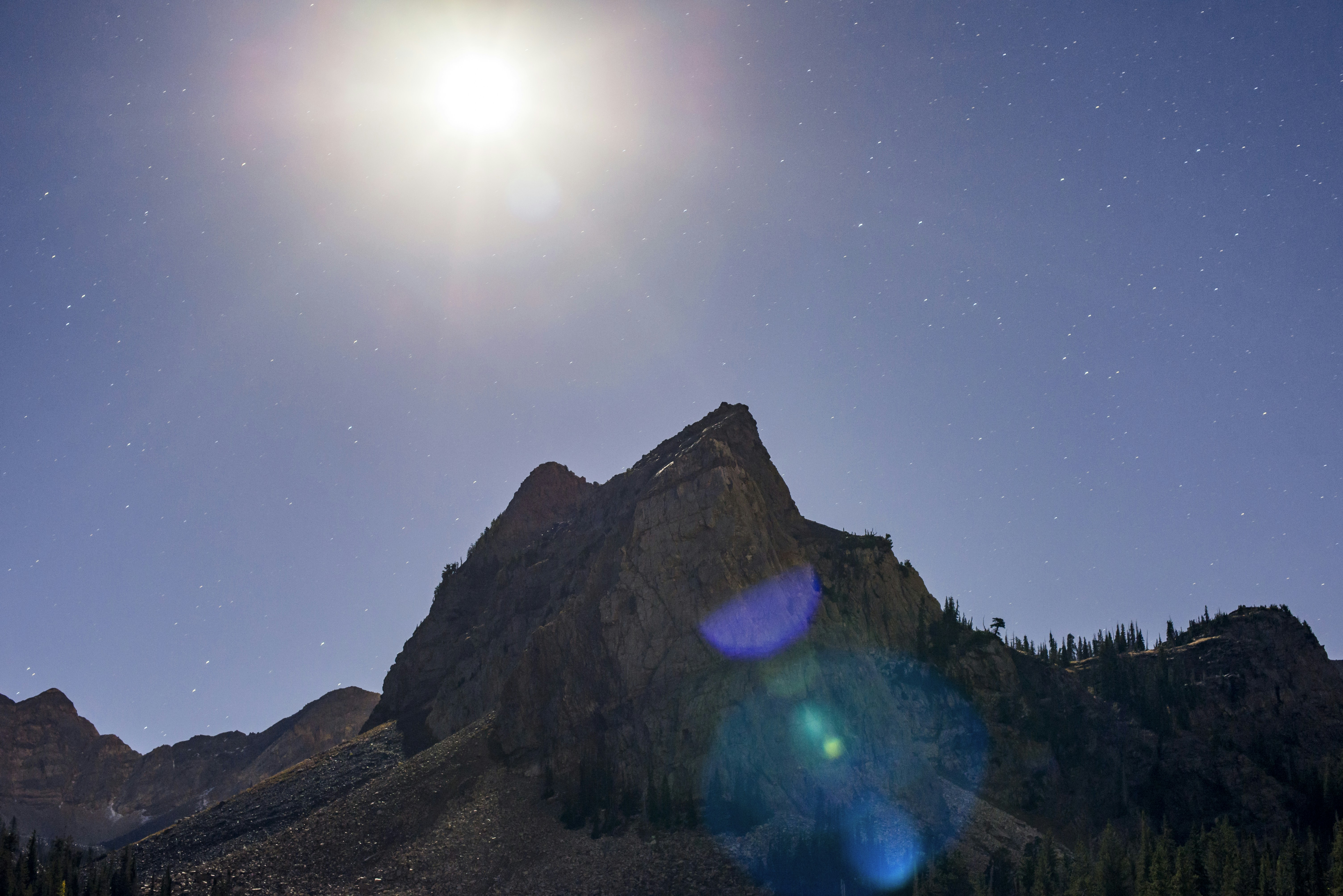 brown mountain under blue sky during daytime