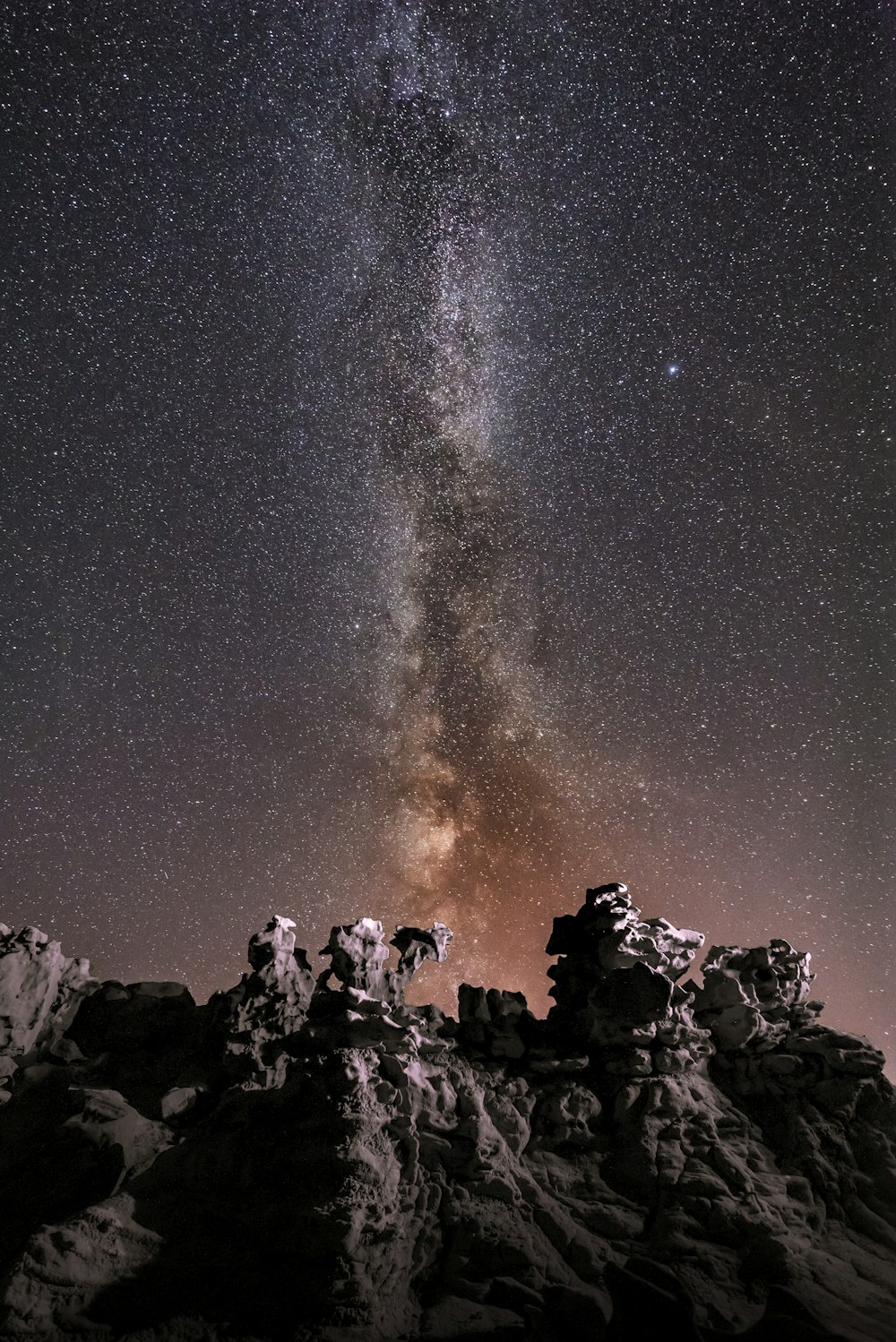 silhouette photography of rock formation