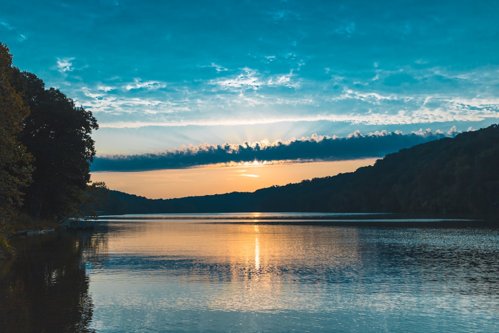 body of water near mountain