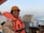 A crew member on a ship enjoying the provided supplies.