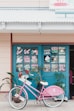 pink bicycle near house