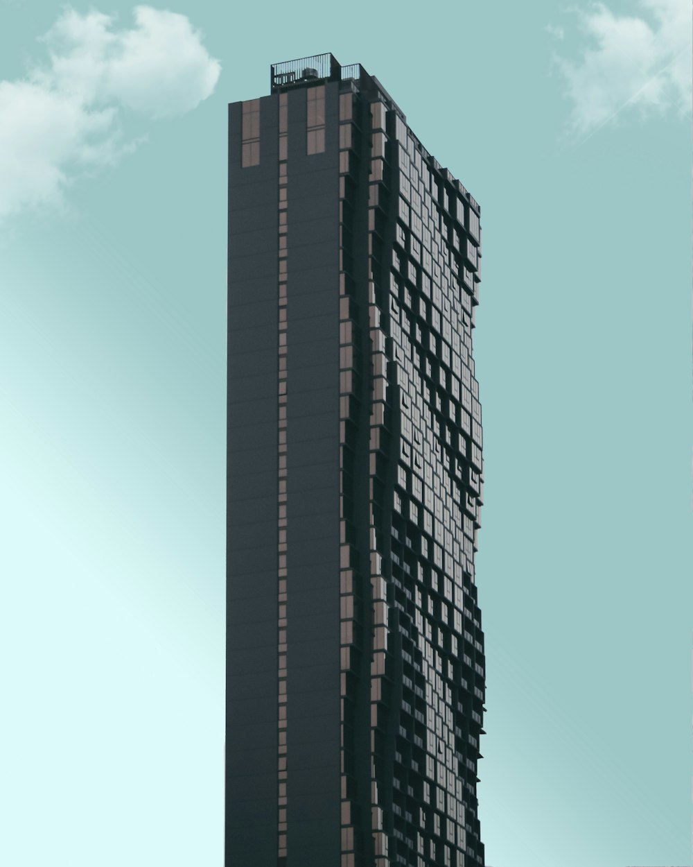 immeuble de grande hauteur noir pendant la journée