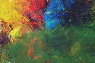 A vibrant mixed-media painting blending bold colors and textures.