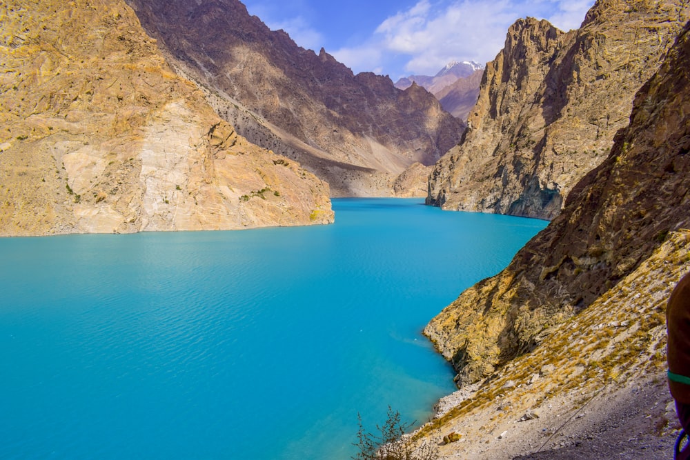 body of water in between canyons