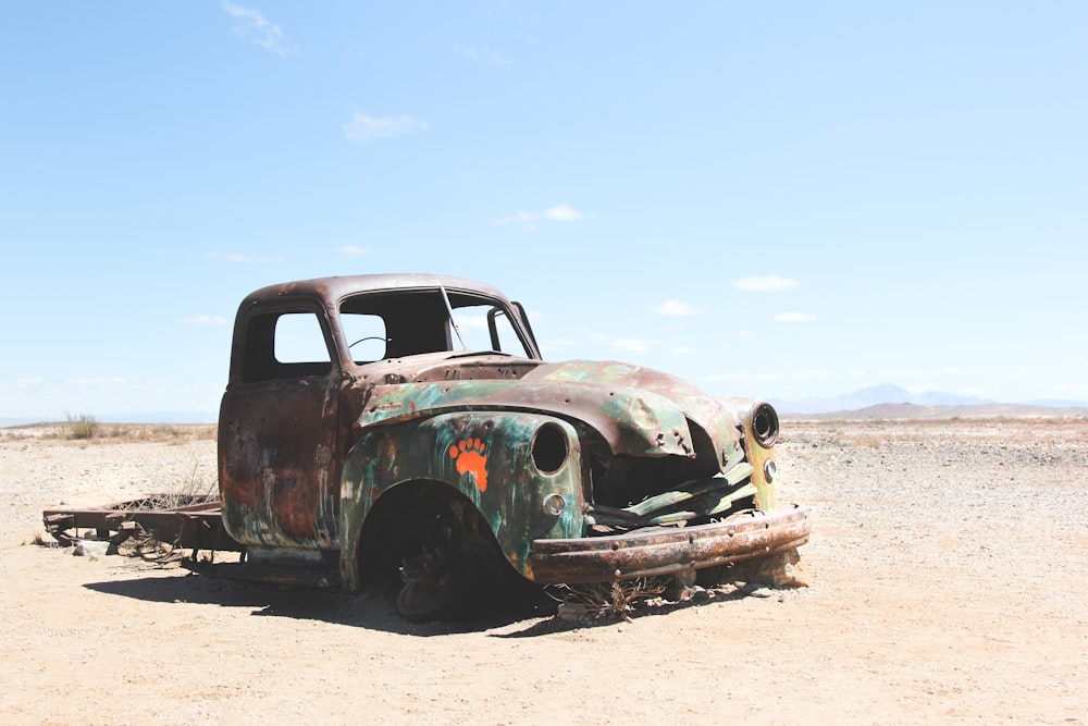 wrecked single cab pickup truck on field