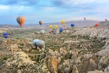 photo of assorted-color air balloon lot in mid air during daytime
