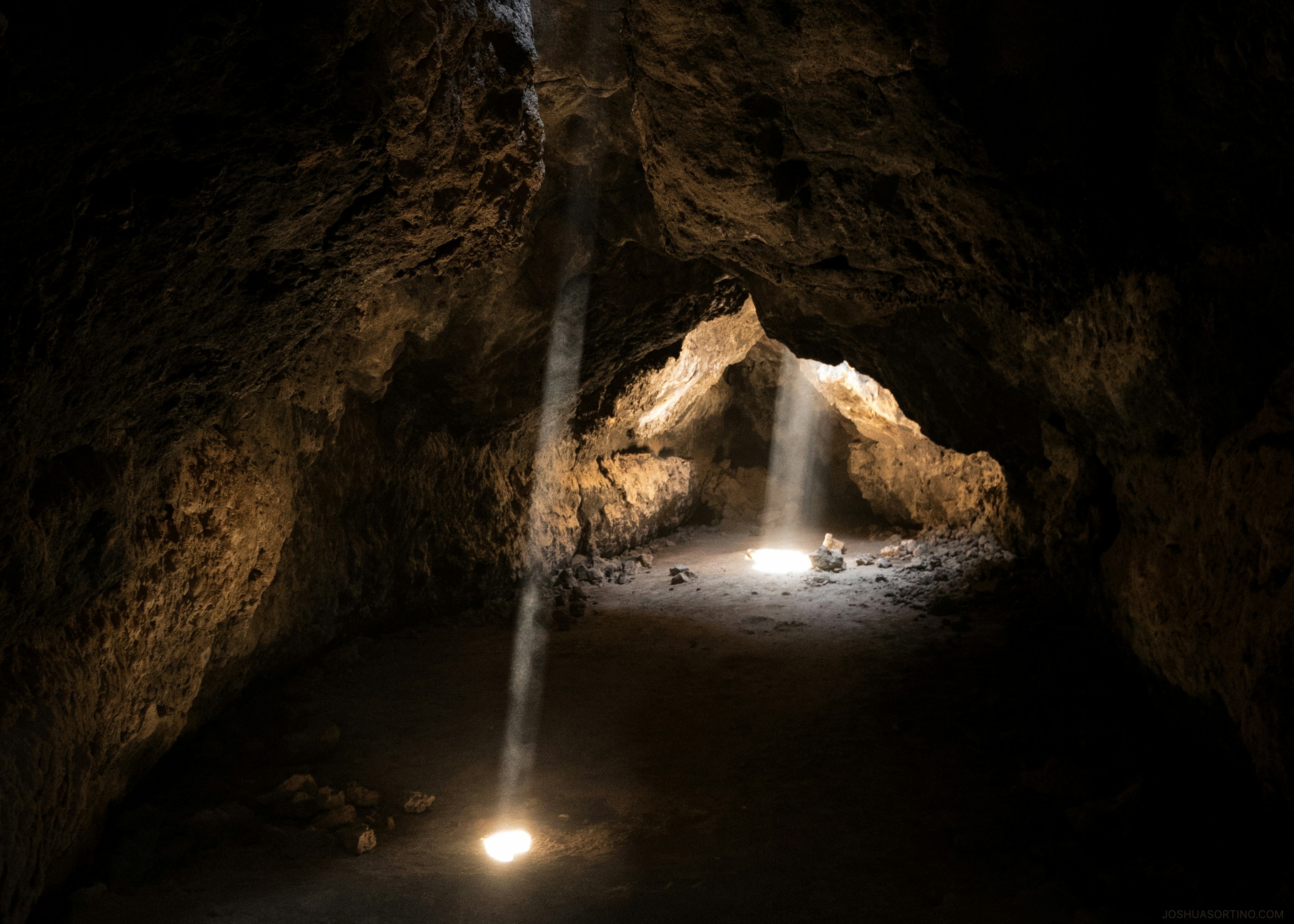 photo of light towards inside of cave