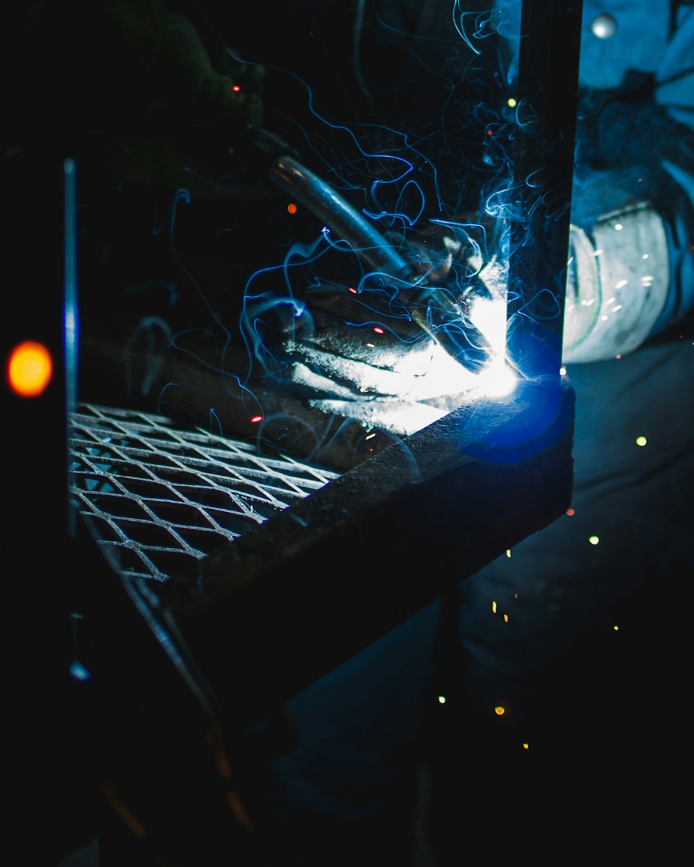 person holding a welding equipment
