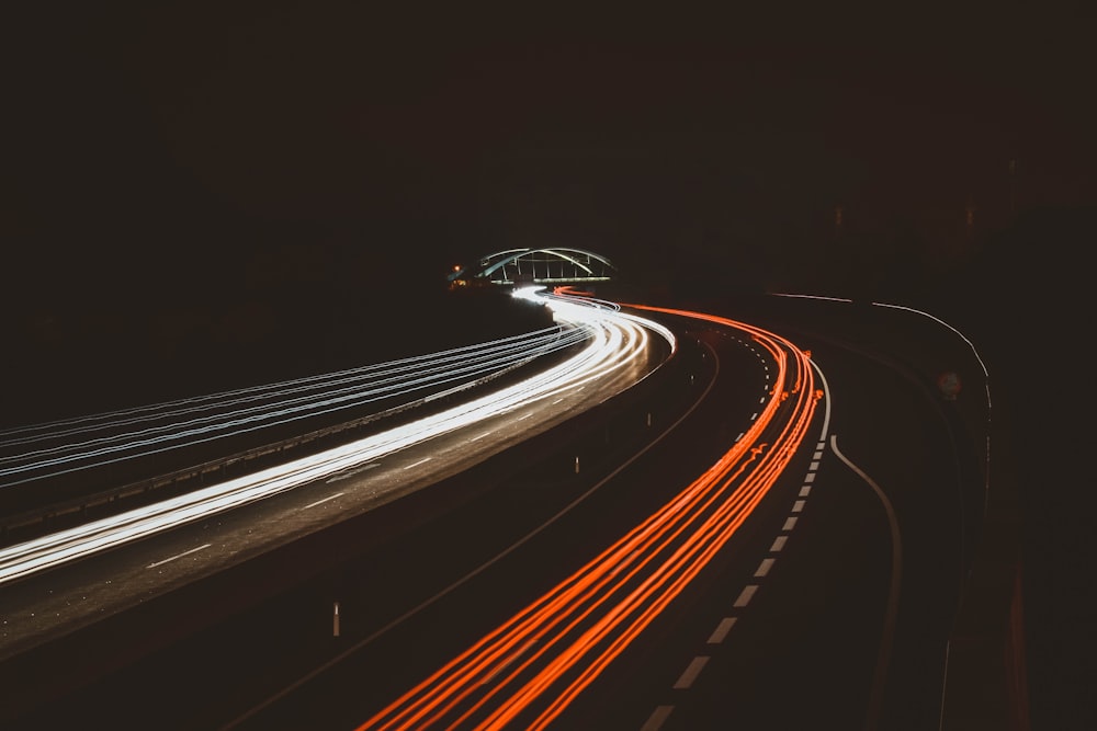 time lapse photography of road at night