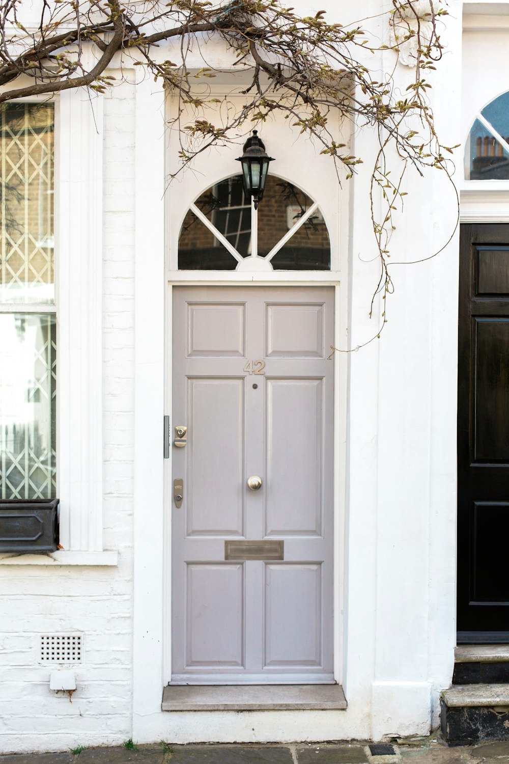 white wooden door mounted white wall