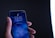 person holding space gray iPhone X