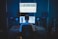 man sitting in front of computer
