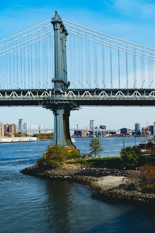 photo of concrete bridge near cities in Brooklyn Bridge Park United States