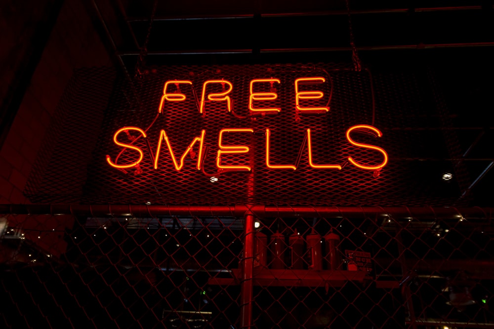 Free Smells neon signage