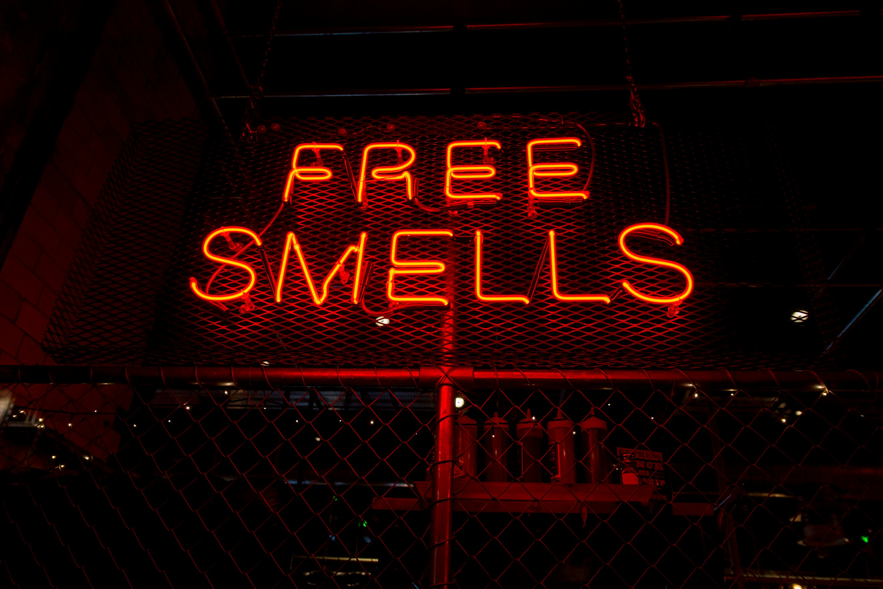 Free Smells neon signage