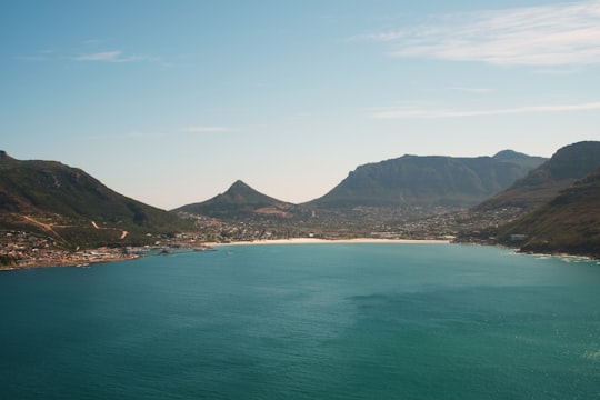 island surrounded by green sea in Hout Bay South Africa