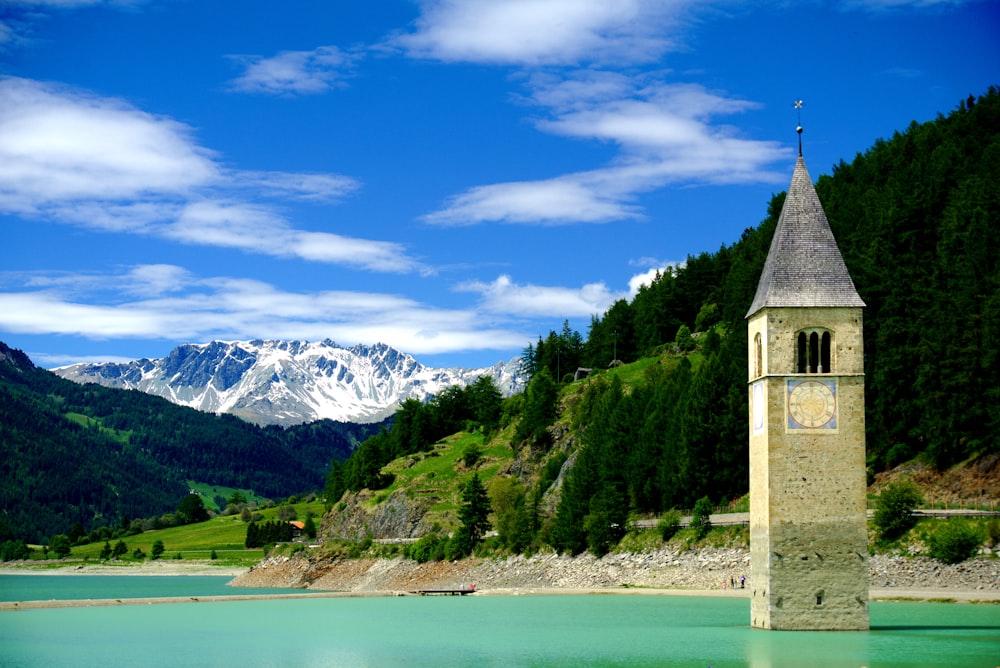 tower near body of water