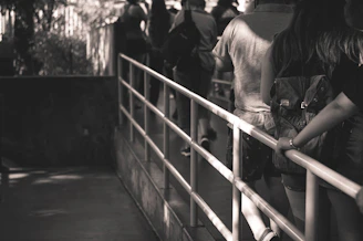Black and white photo capturing the disciplined posture of students lined up before training begins.