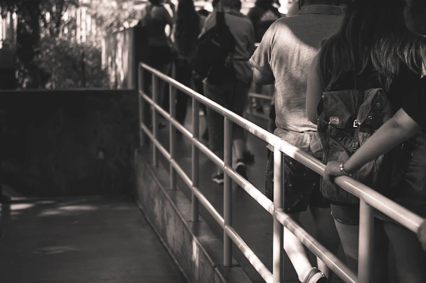Black and white photo capturing the disciplined posture of students lined up before training begins.